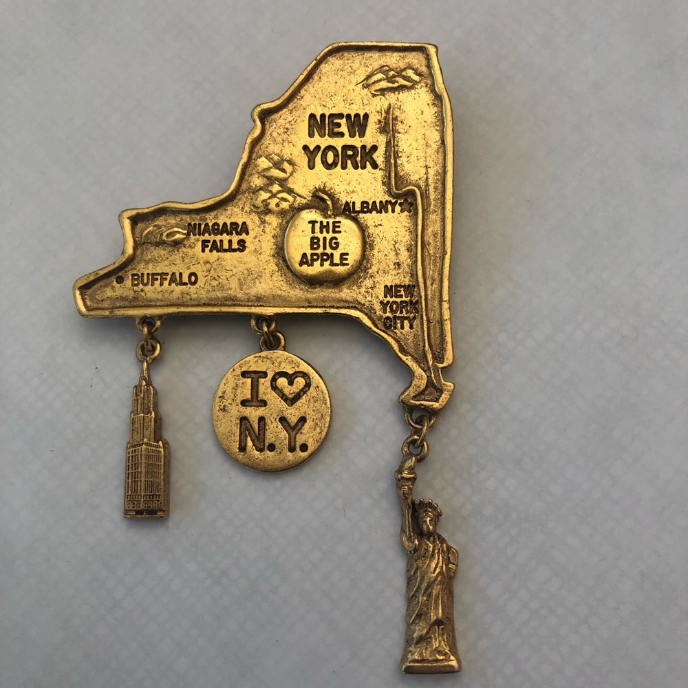 Gold metal New York Brooch